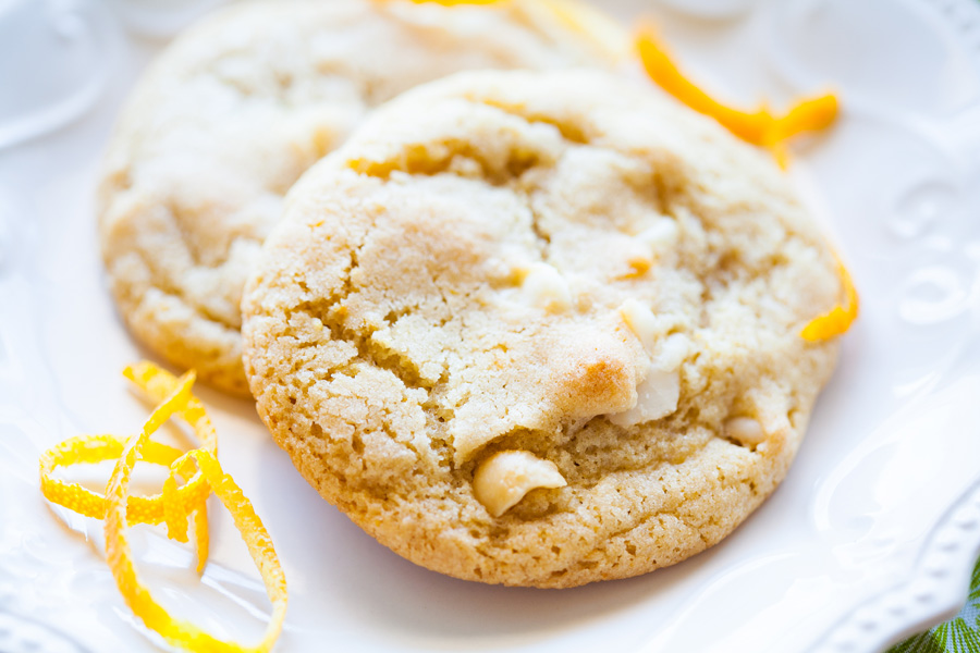 Orange White Chocolate Macadamia Nut Cookies are a new twist on the classic cookie we all love so well! With orange peel and orange essential oil (or extract), these cookies will become a favorite! Macadamia nut cookies, white chocolate cookies, orange cookies, Christmas cookies