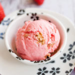 Gorgeous pink strawberry ice cream inspired by the classic strawberry pretzel dessert! Super easy to make, and so beautiful to behold!