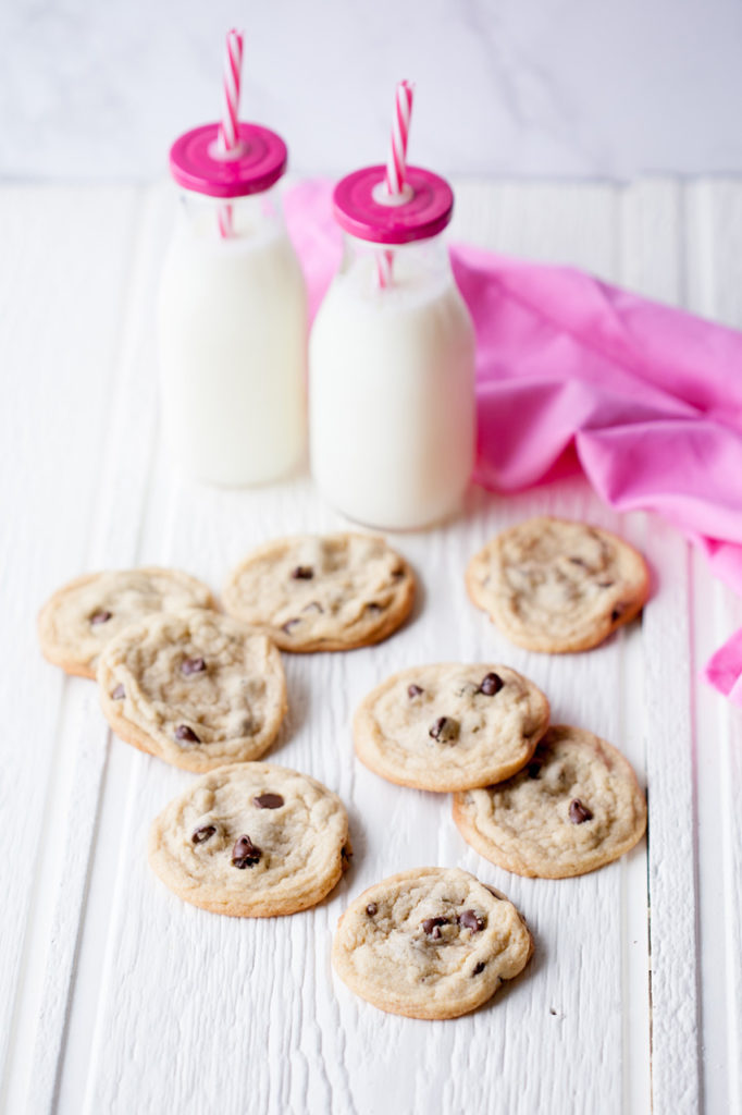 The PERFECT Chocolate Chip Cookie Recipe from my college days! This recipe makes a TON, and the cookies come out perfect, every time! Best chocolate chip cookie recipe ever!