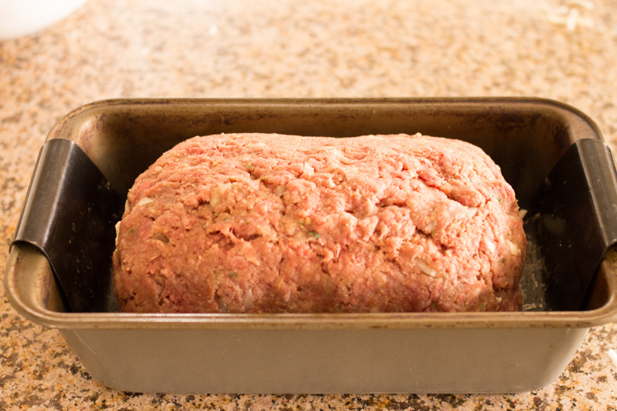 Sunday dinner just got awesome! Try this impressive stuffed meatloaf and you'll never make ordinary meatloaf again!