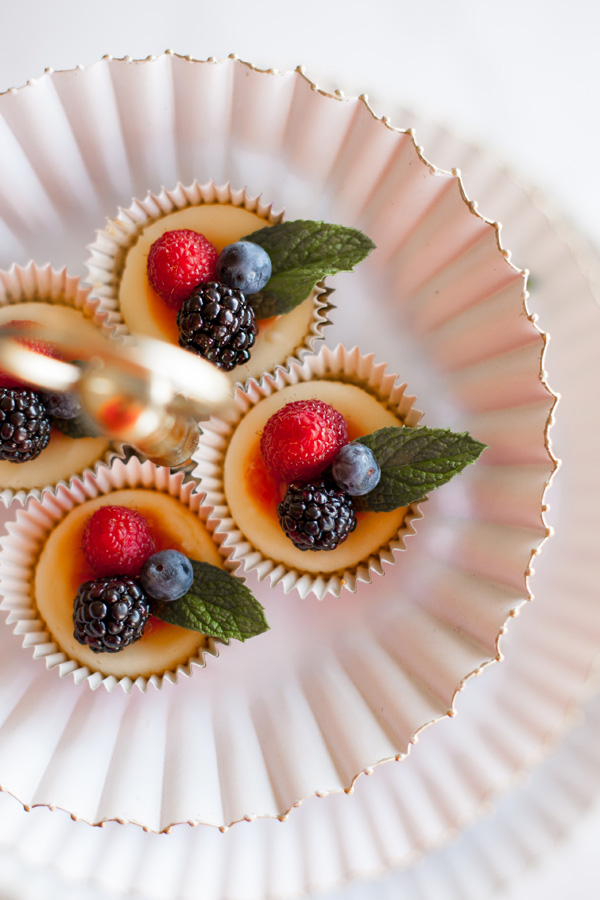 These Easy Mini Cheesecakes are the perfect party food. From wedding receptions to to baby showers, these desserts look gorgeous and taste even better! 