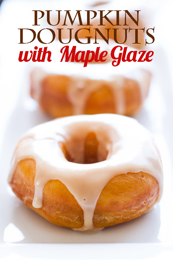 Pumpkin donuts with maple glaze are the perfect donuts for Fall. Real pumpkin and maple syrup makes this the best donut recipe around!