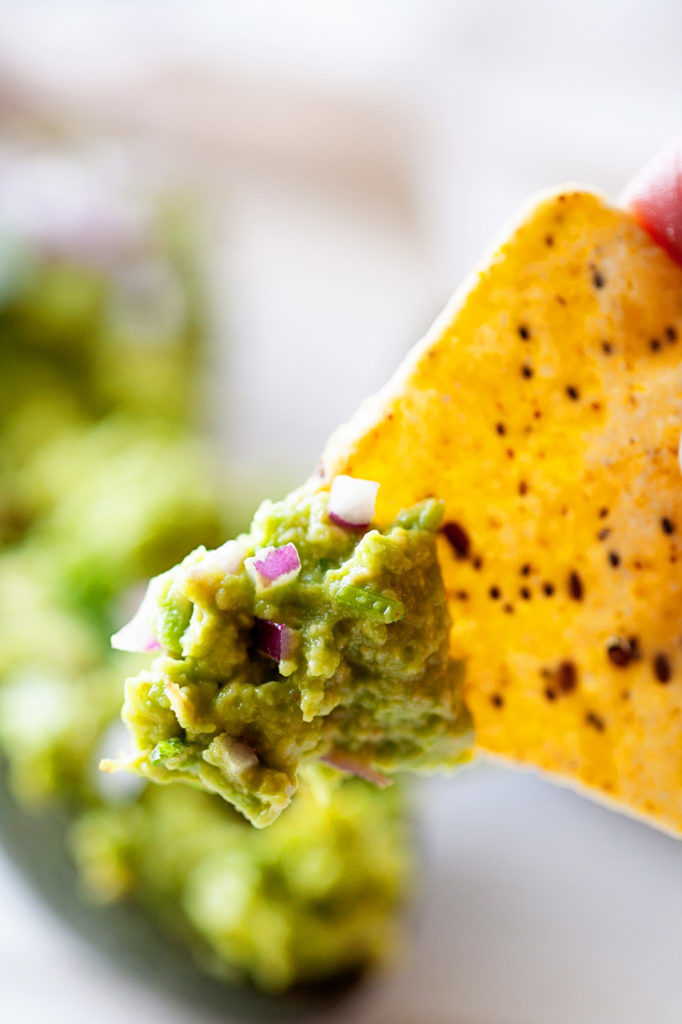 Use this Classic Guacamole to dress up all your dishes. From fajitas to eggs to burgers, nothing beats the amazing color, texture, and flavor of guacamole! Guacamole recipe, easy guacamole