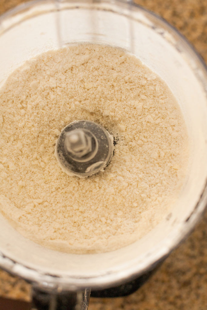 Pie crust ingredients mixed together in food processor
