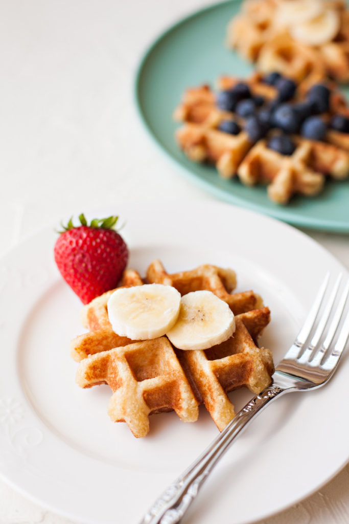 Liege waffle topped with banana slices.